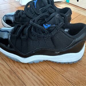 Jordan Kids Black Sneakers with Blue Highlights